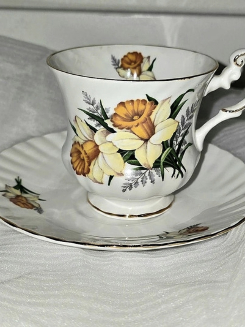 Queen's March Floral Teacup & Saucer Set in White & Yellow